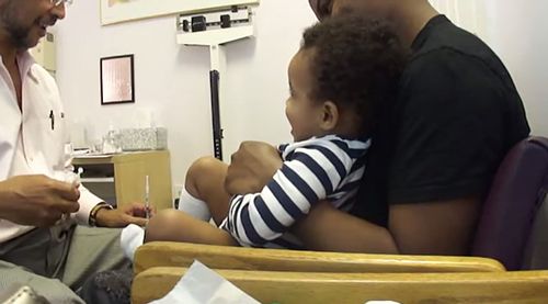 Baby_laughing_while_getting_shots.jpg