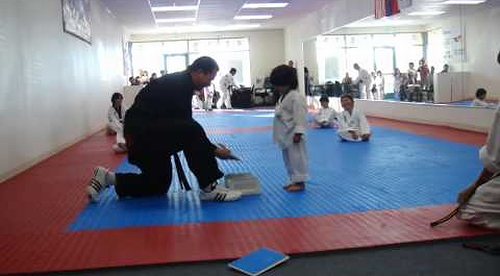 Little_Boy_Trying_To_Break_Board.png