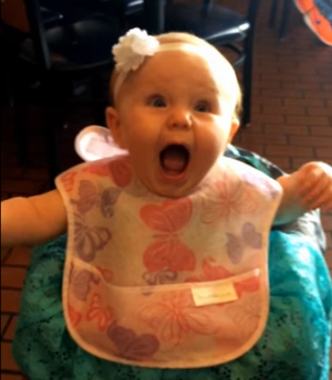 Baby_Girl_Beyond_Excited_to_Eat_Each_Bite.png