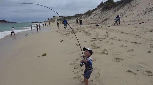 3_year_old_catching_6kg_salmon.jpg