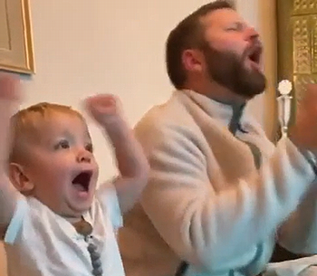 Watchingthegamewithdad.png