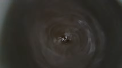 camera_under_a_running_tap.png
